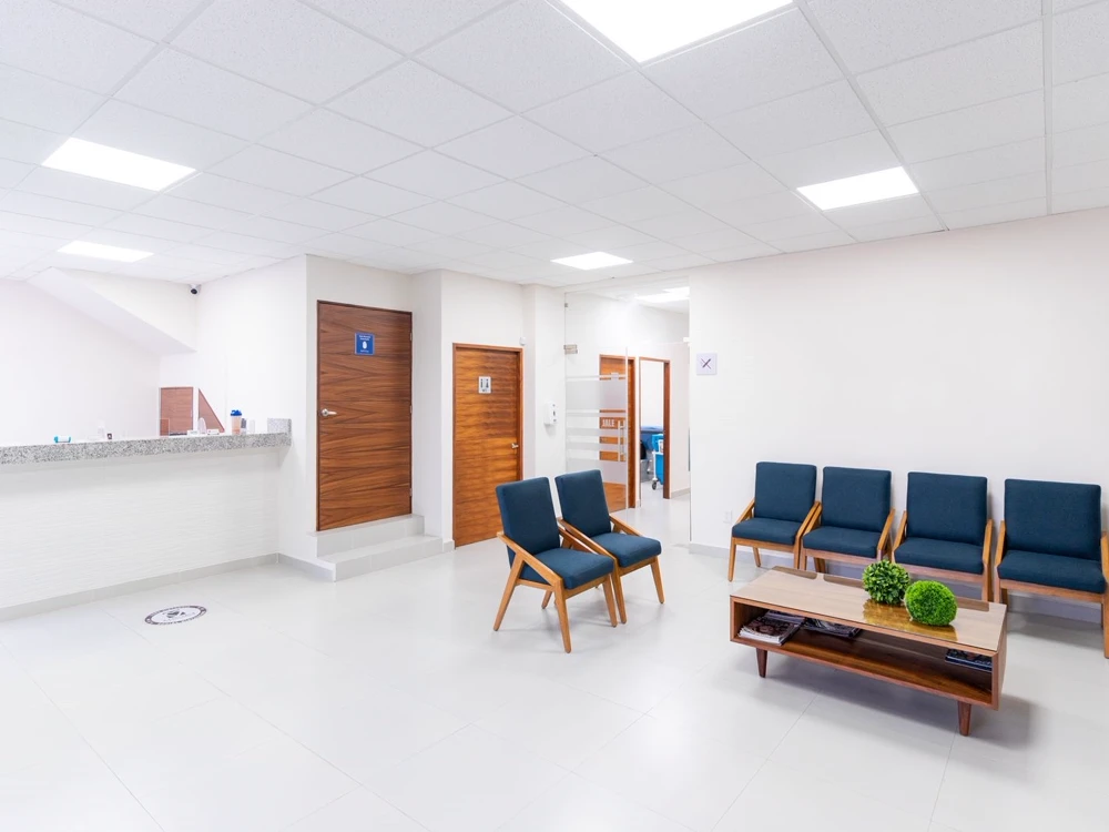 Reception area of Painted Post Family Dentistry with natural light and comfortable seating